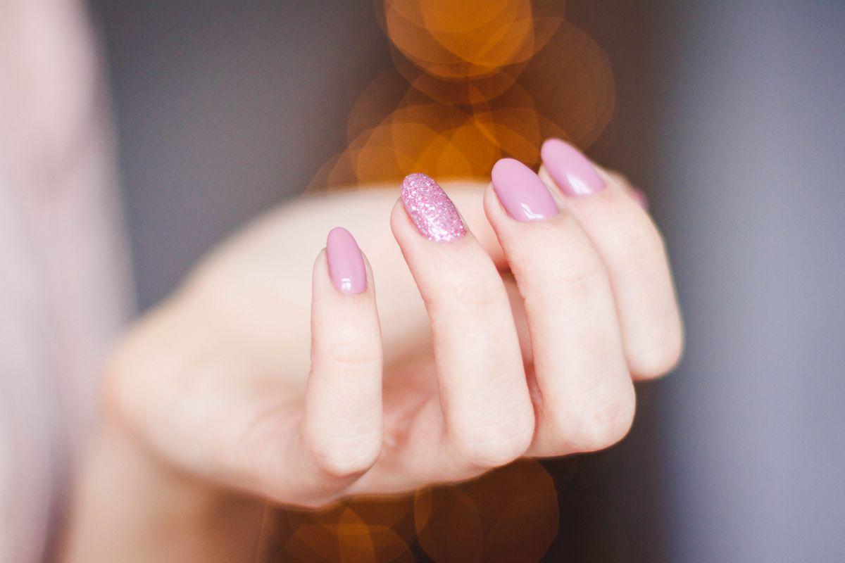 Glossy pink nail set by NailD By Nisha
